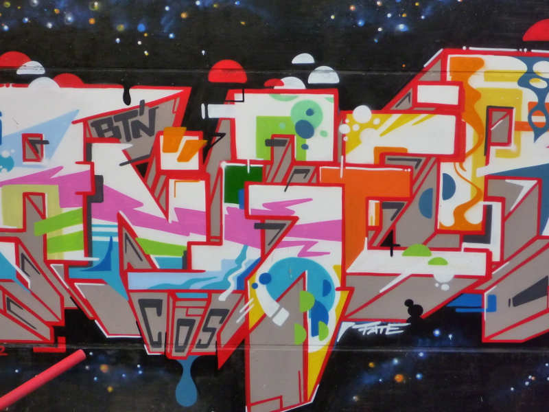 Spray-painted wall off the streets in Hamburg's HafenCity