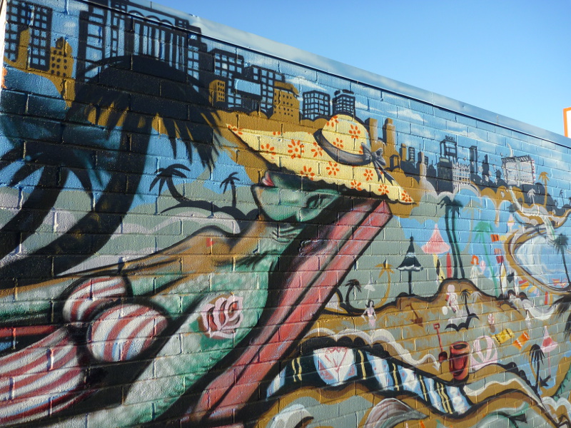 Wallart in Reno's Midtown: sun-tanning woman
